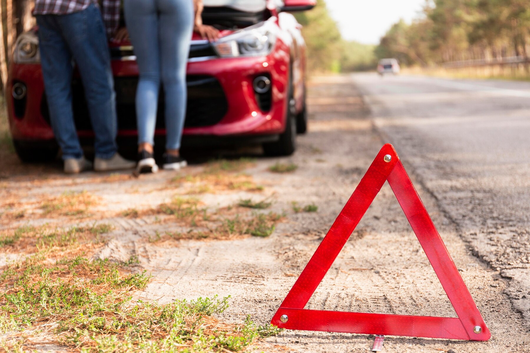 red-triangle-sign-road-car-problems-while-traveling_23-2148714903